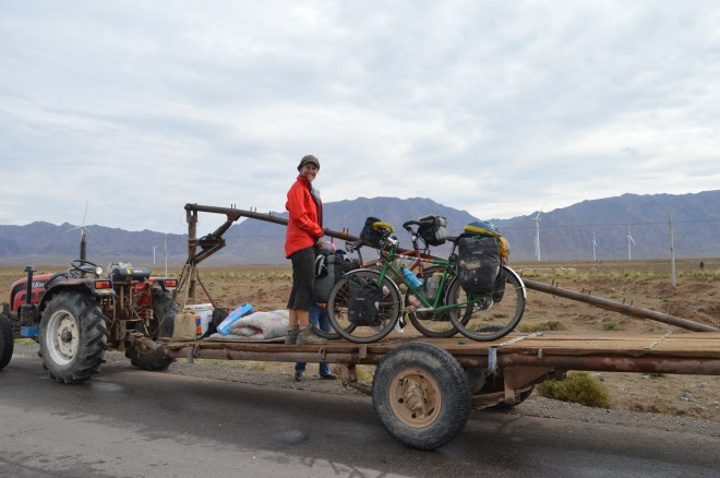 Putting the bikes on the back of the tractor.