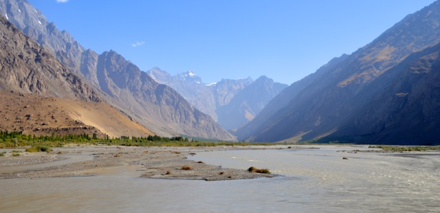 The road hugs the Panj River.