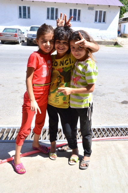 The children continue to request to have their photos taken.