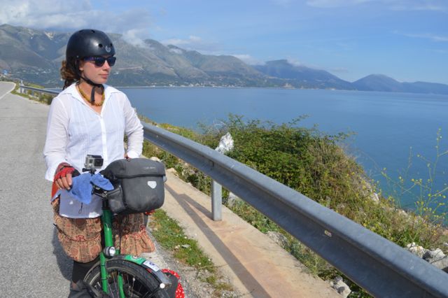 In the background you can see the road rising and falling along the coastal cliffs.