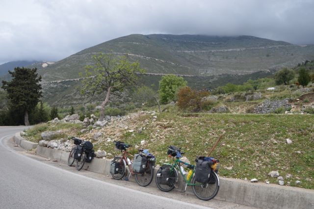 The ladies with the road ahead up the mountainside.